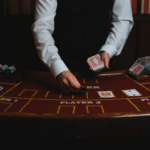 casino dealer setting up cards