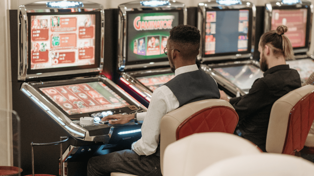 men playing slot machines