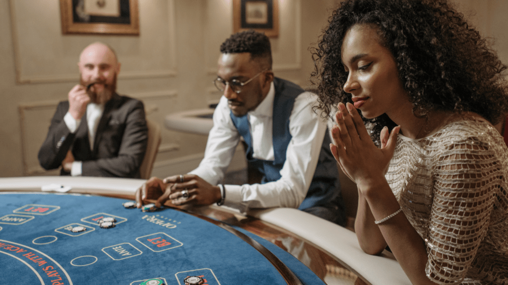 people betting on a casino table